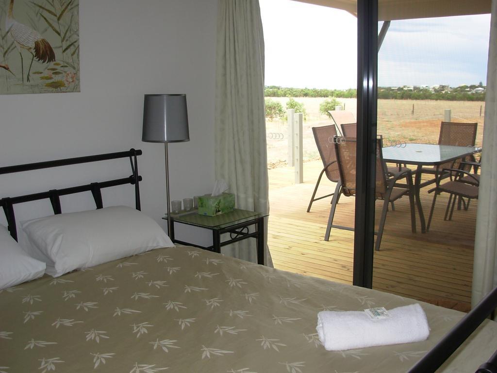פורט אליוט Linger Longer Cottages חדר תמונה